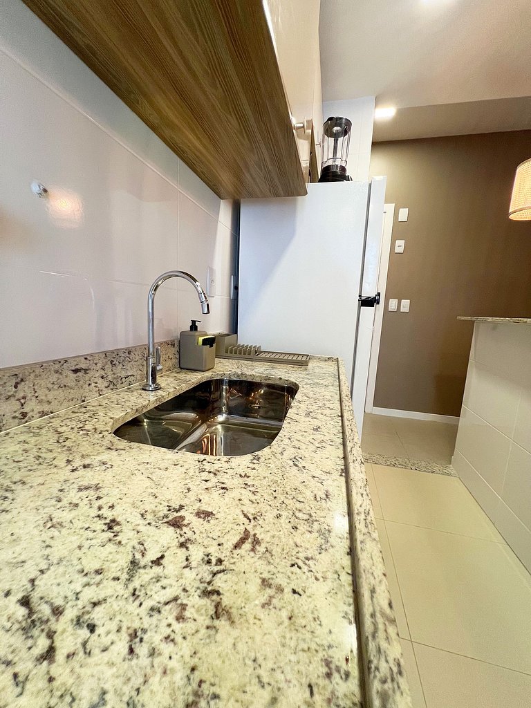 Pé na areia da Praia de Atalaia