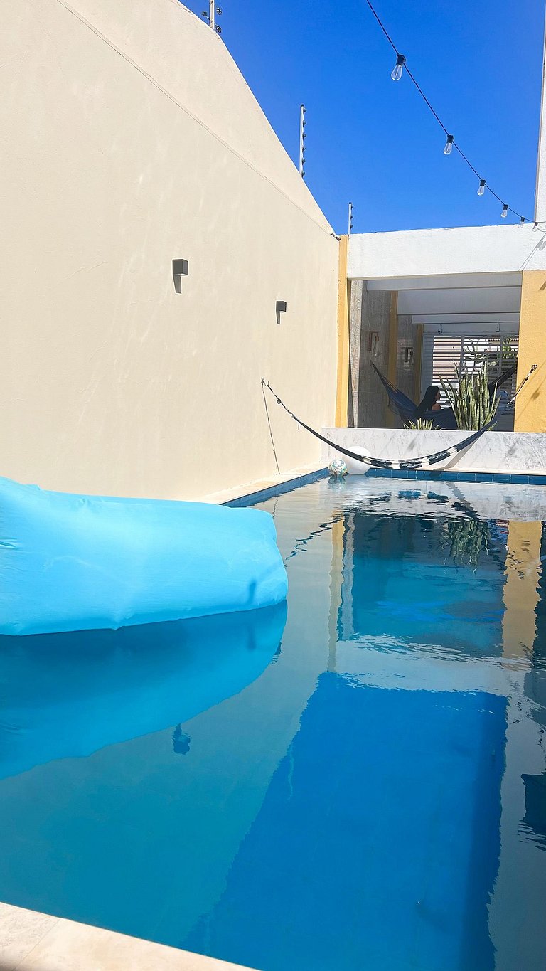 Varandinha Arejada a 700m da Praia by Apê