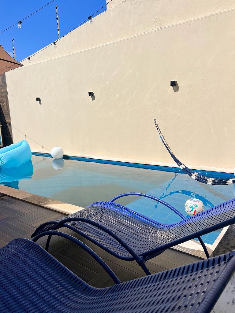 Varandinha Arejada a 700m da Praia by Apê