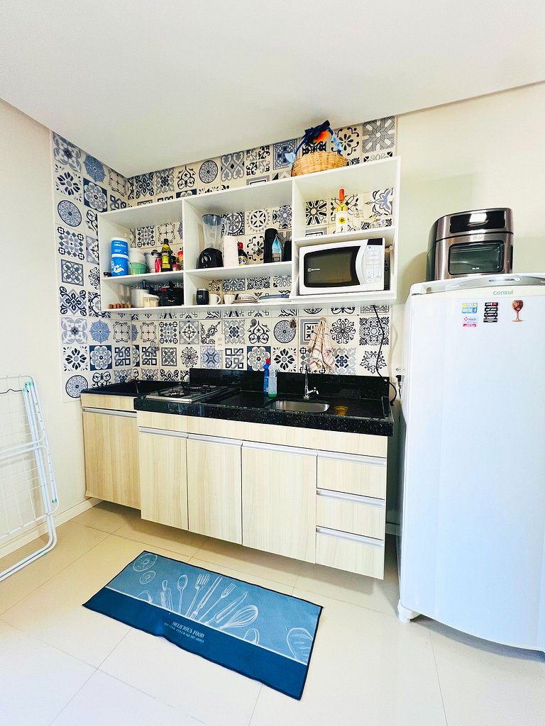 Varandinha Arejada a 700m da Praia by Apê