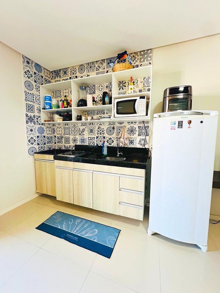 Varandinha Arejada a 700m da Praia by Apê