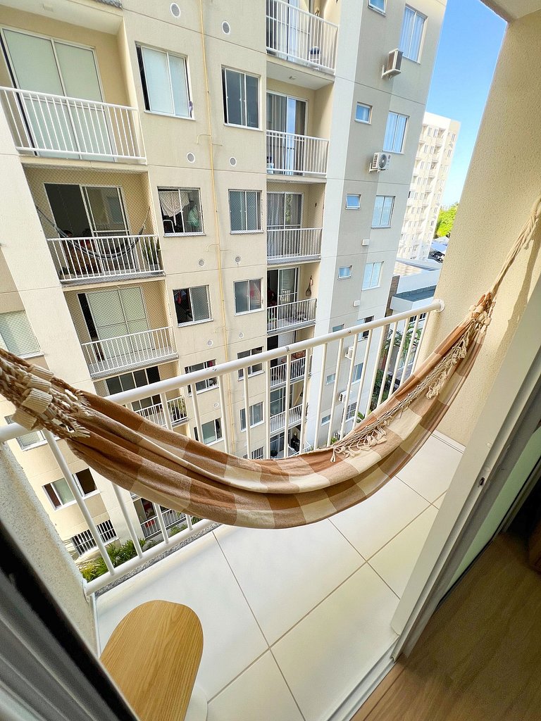 Aconchego proximo Praia e Aeroporto com ar by Apê