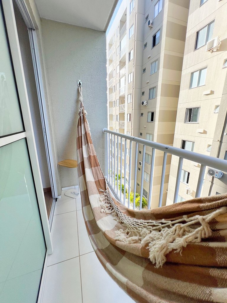 Aconchego proximo Praia e Aeroporto com ar by Apê