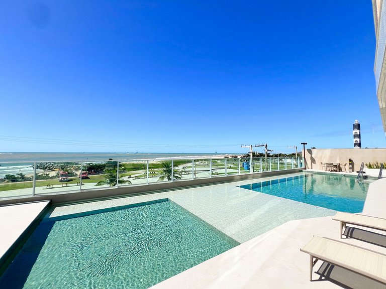 Pé na Areia na Atalaia Vista Mar e Piscina by Apê