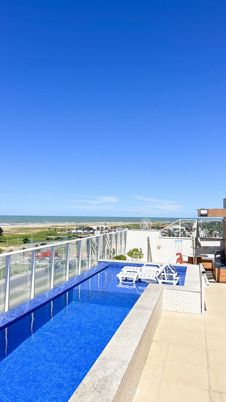 Varandão Frente Mar com Piscina Panorâmica by Apê