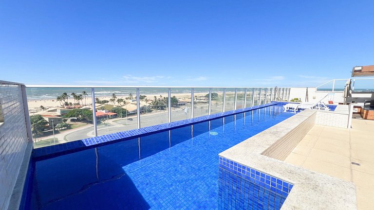 Varandão Frente Mar com Piscina Panorâmica by Apê